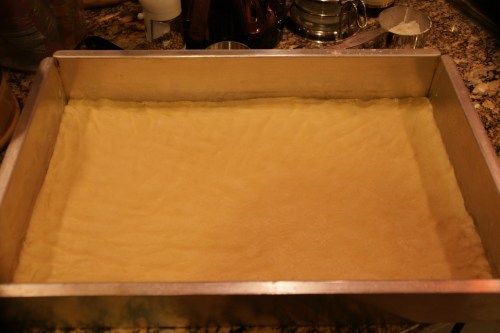 The base is fairly thin; I floured my hands to prevent the dough from sticking to my fingers.