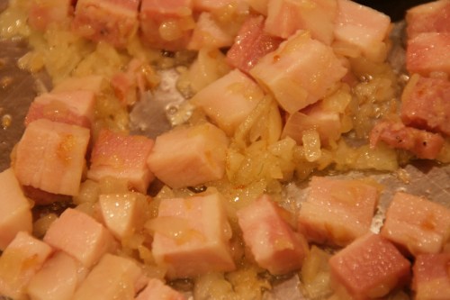 Don't brown the pancetta.  It's going to cook more with the tomatoes!