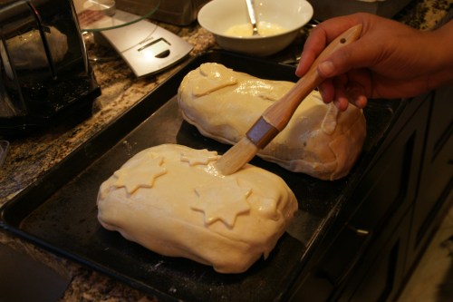 The egg wash helps to create a brown crust.