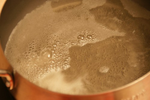 Wine/lemon must be bubbling in order to melt the cheese