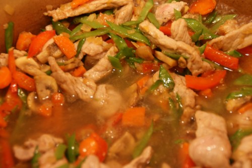 The vegetables and pork will not be completely submerged in the liquid