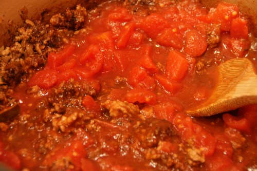 Use your spoon to scrape up any browned bits on the bottom or sides of the pot