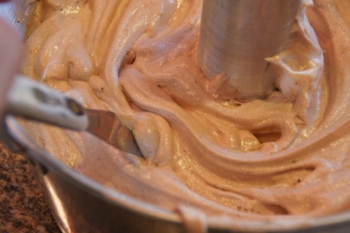 Break up any air pockets by swirling with an icing spatula or small knife