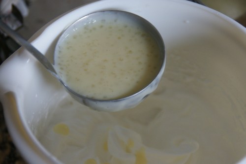 Tempering warms the whites; otherwise the whites would coagulate when added to the hot custard