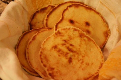 Scoop up the dal with torn bits of homemade garlic naan!