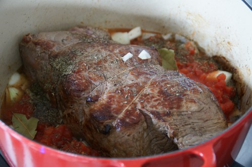 Surround the roast with the braising ingredients