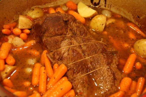 Try to nestle these down into the pot, around the roast