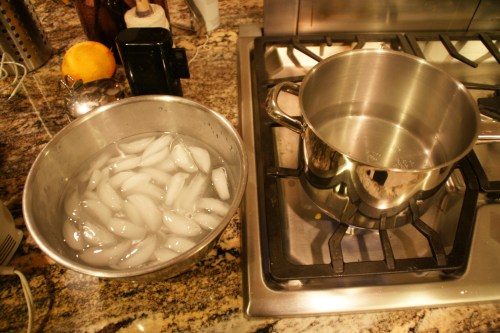 You don't want the bowl to be able to touch the water or the chocolate will burn