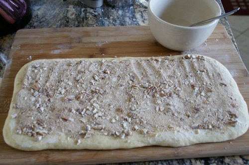 You can use your hands to GENTLY press the filling into the butter/dough