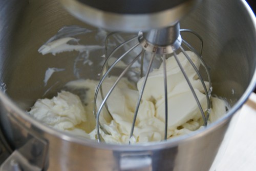 Use the whisk to whip the cheeses together until smooth