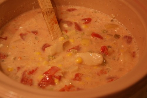 The tomatoes give the soup a pinkish tinge which looks pretty against the fish, potatoes, corn and limas!