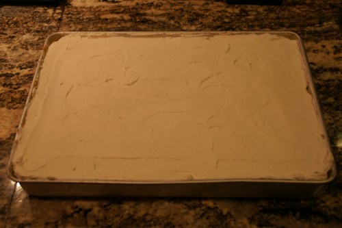 Use an offset spatula and frosting is a piece of cake (hee hee)