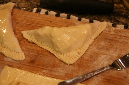 I always seal with a fork, but you can just press with your fingers.