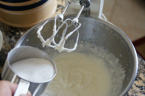 Add sugar a little at a time