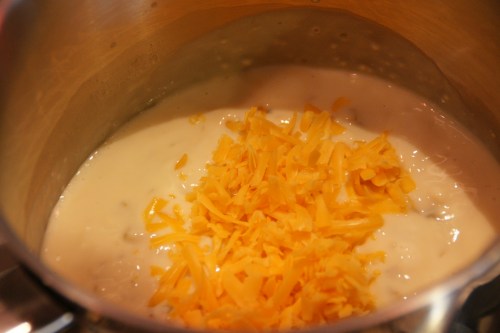 Melt the first batch of cheese thoroughly before adding the next!