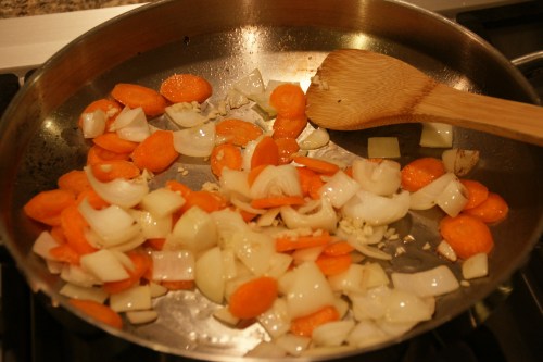 The onions will blister, the carrots will sizzle! Watch the garlic so it doesn't burn!