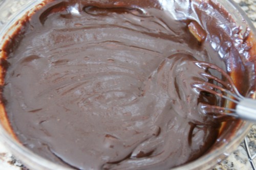 Whisk lightly to help cool