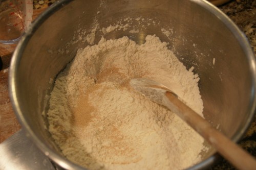 I like to keep the yeast on top so it makes contact with the water first