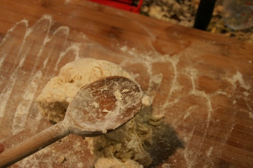 I use flour to rub off any sticky bits clinging to the wooden spoon