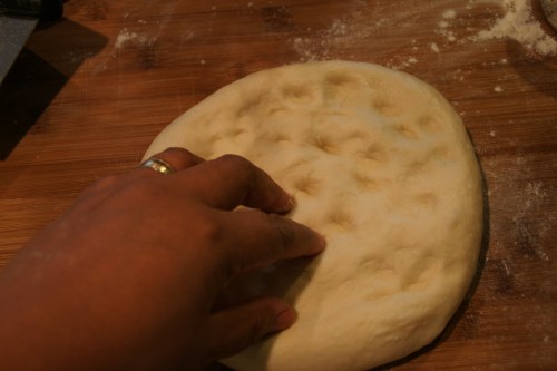 Gently de-gas. You don't want to press all those air bubbles out!