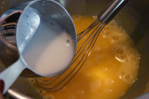 Tempering the eggs-- do NOT stop whisking as I did here (to take the shot)!