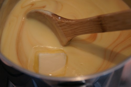 The butter stops the cooking and finishes the pudding