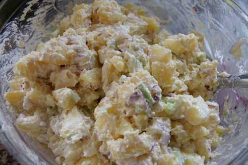 You don't have to have the salad fully mixed since you still have to add the eggs