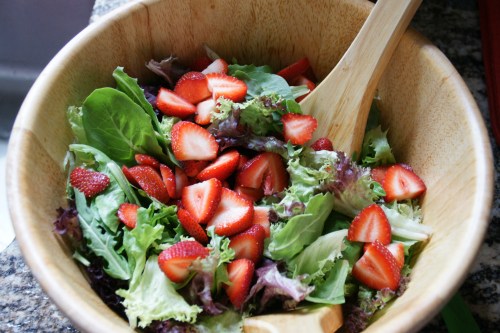Mixed lettuces, sliced strawberries, a drizzle of 25 year-old balsamic vinegar and California Olive Ranch oil!