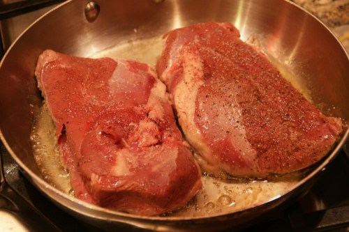 After a few minutes, the fat will begin to render and sizzle!