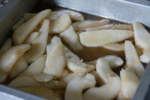 The pears will release some of their juice as they soften