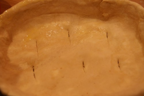 I just let the dough sit on top of the filling-- just like a regular pie!