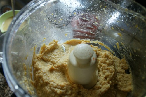 After the lemon water-- the paste is becoming smoother.