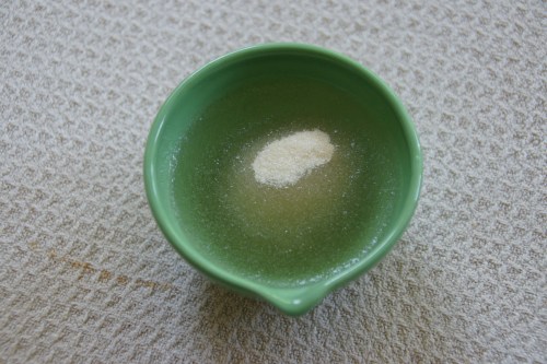 Do not stir the gelatin; it will soften and absorb the water as it sits.